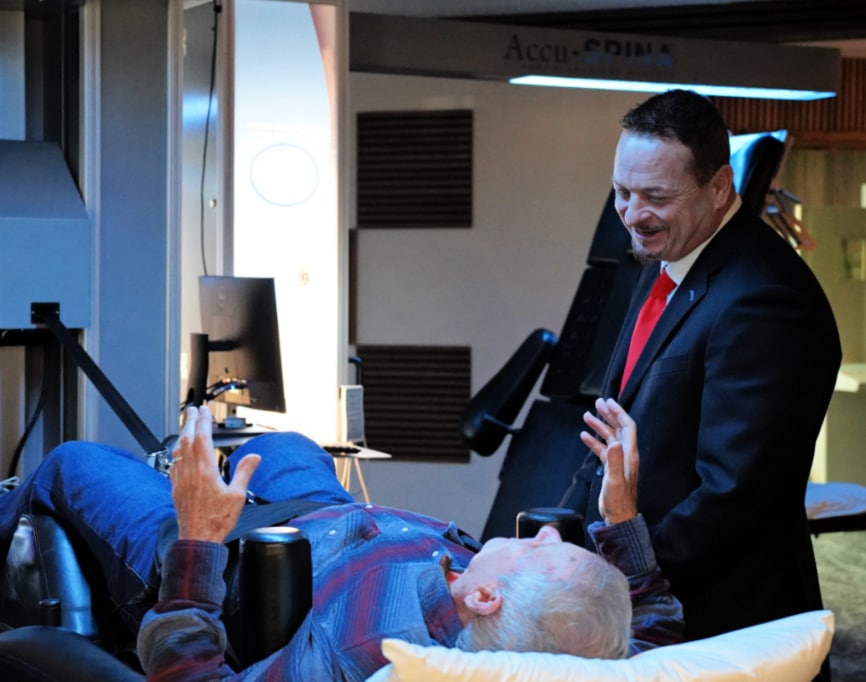 image of Dr Todd Clanahan with a spinal decompression therapy patient